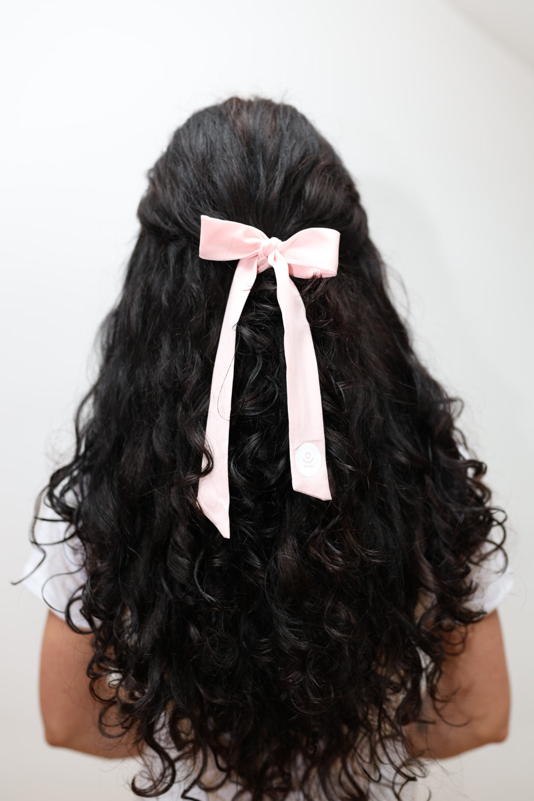 pink hair scrunchie with bow