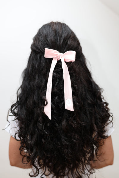 pink hair scrunchie with bow